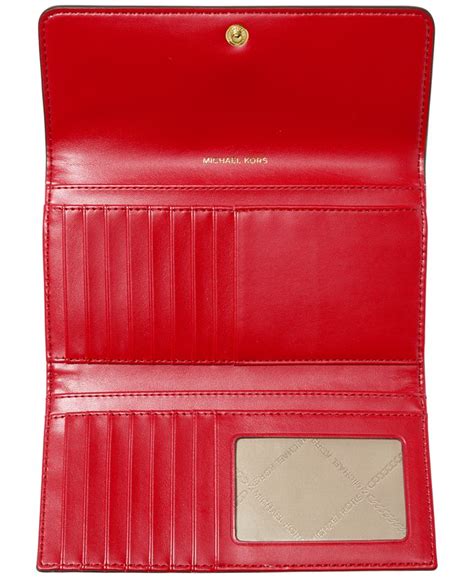 michael kors jet set charm large trifold wallet|Michael Kors vanilla jet set.